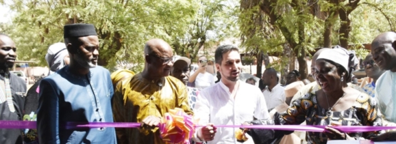 Cutting the ribbon at the opening