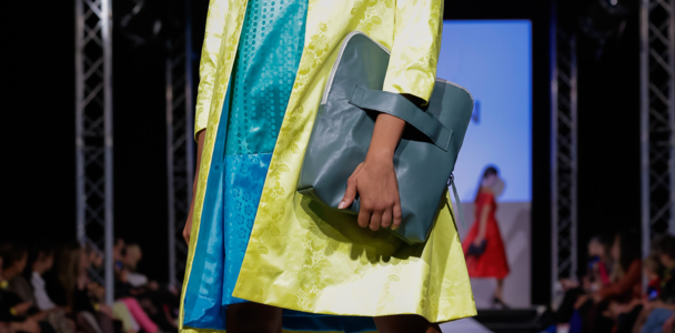 Fashion show Model in yellow/turquoise dress